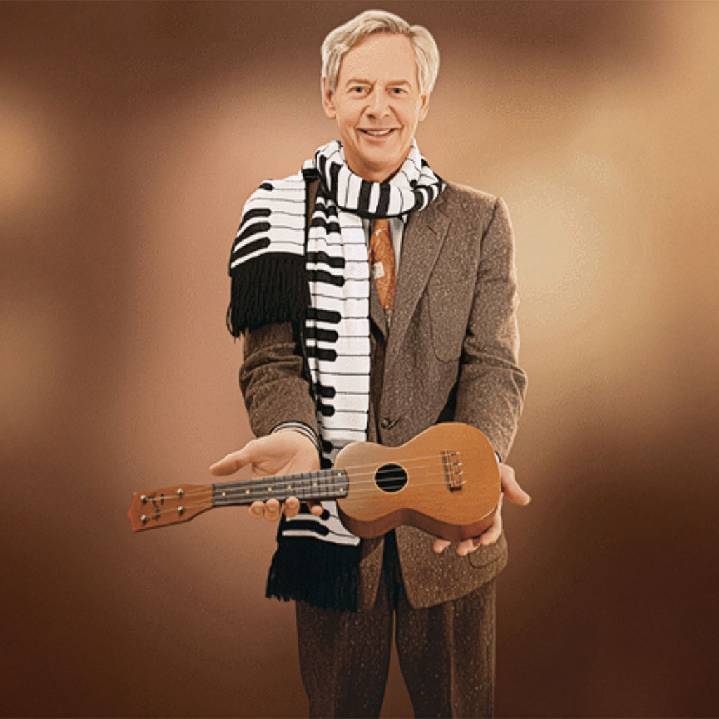 An image of British pop star Ian Whitcomb holding his ukulele