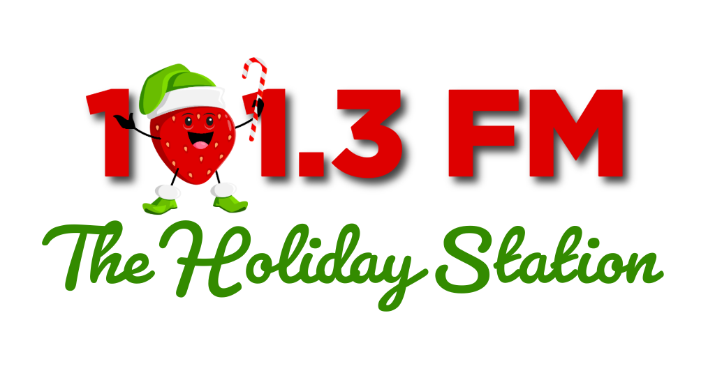 The Holiday Channel logo featuring a strawberry character wearing a Santa hat and holding a candy cane